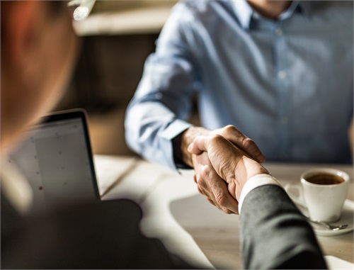Business people shaking hands